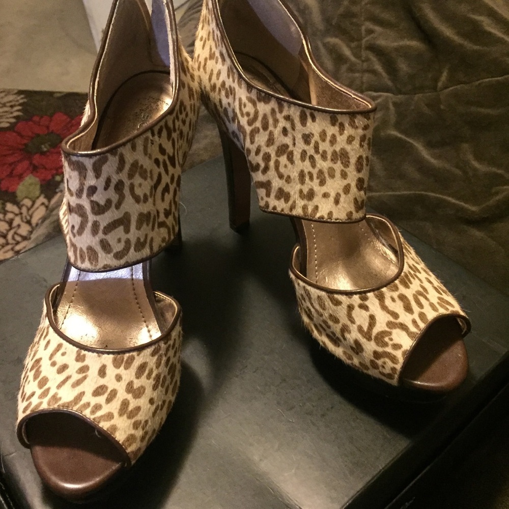 BCBG platform peep toe animal print heels.
